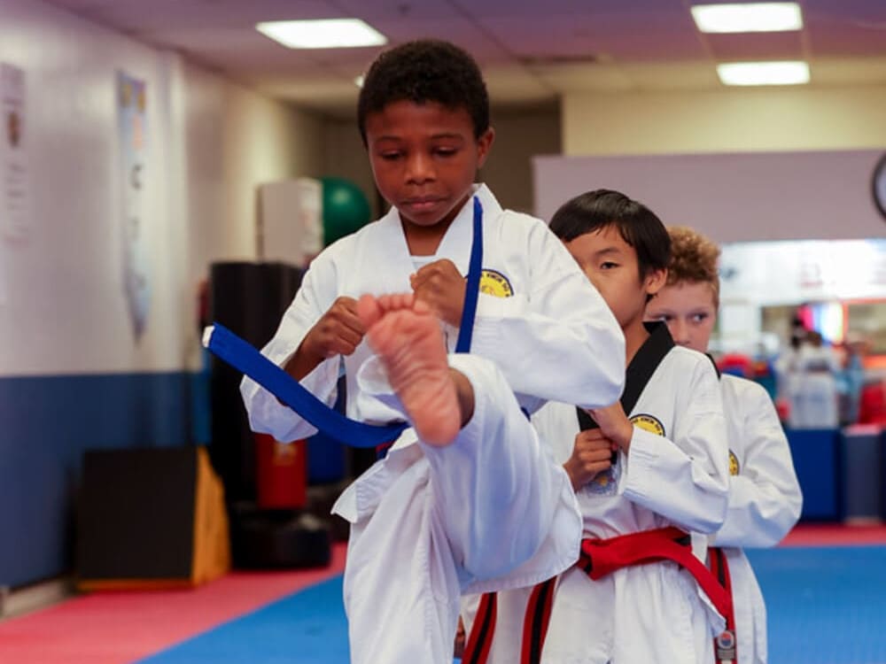 a group of kids form a line to practice taekwondo in Norristown PA