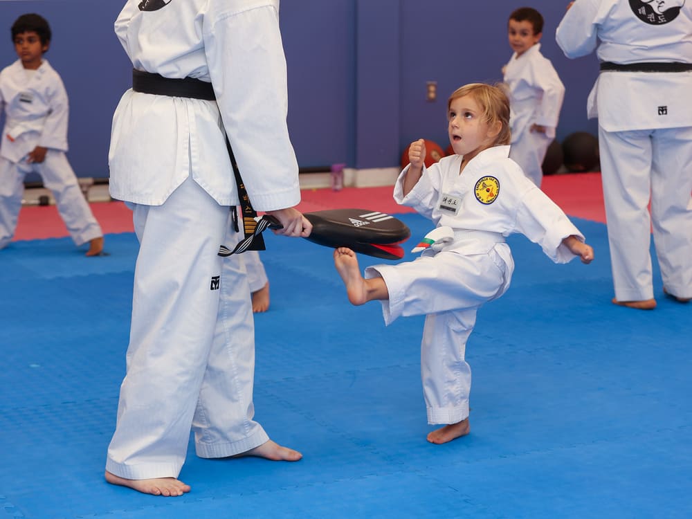 a young girl practicing taekwondo kicking in Norristown PA